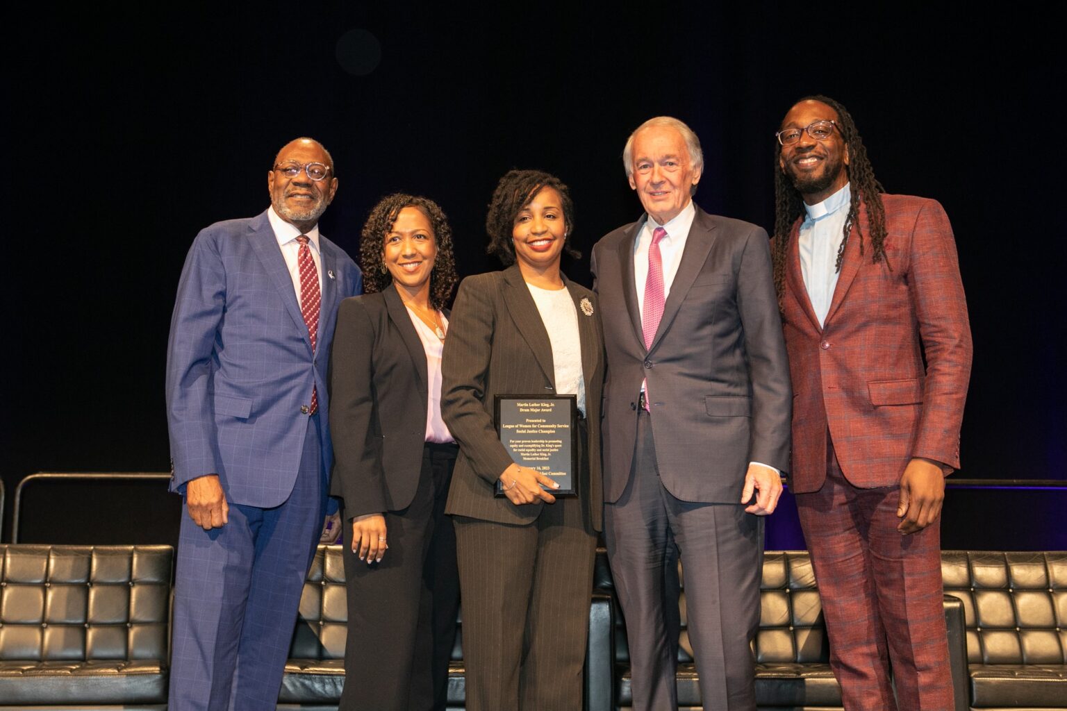 Kalimah Redd-Knight, representing League of Women in Community Service, accepts, the 2023 Drum Major Award with Sen. Ed Markey and MLK Memorial Breakfast Committee Co-Chairs James Dilday, Esq., and Rev. Dr. Jay Williams.
